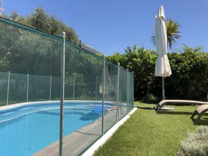 a barrier fence set up for pool safety