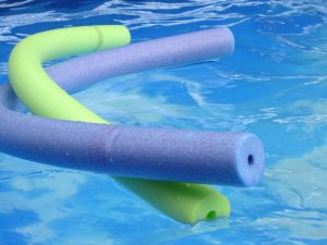 purple and green pool noodles