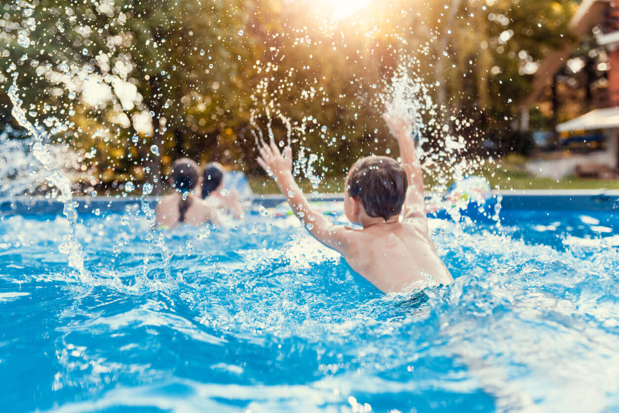 Kid splashing in pool